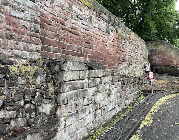 A section of the Roman east wall by the steps to Frodsham Street , near the Bell Tower.