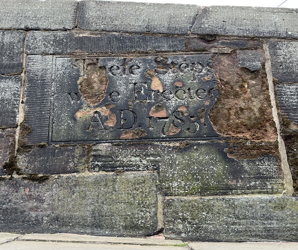 Commemorative tablet denoting installation of the Wishing Steps in 1785.
